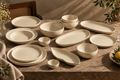15-piece ivory dinner set with plates, bowls, platters and serving dishes